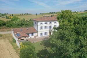 Traditional cascina for sale in Castagnole Monferrato with garden and land by Italian Hillside