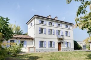 Italian Hillside cascina for sale in Castagnole Monferrato with vineyard views and garden