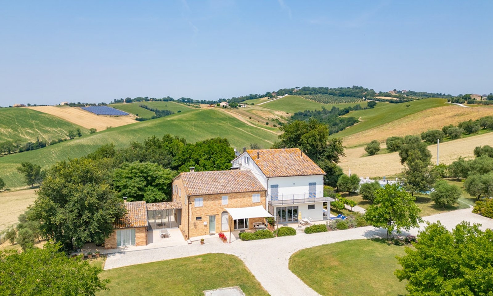Restored farmhouse with pool for sale in Belvedere Ostrense, Marche, Italy – Italian Hillside Real Estate