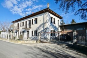 Traditional farmhouse with vineyard views and winery space in San Marzano Oliveto – Italian Hillside property for sale italy